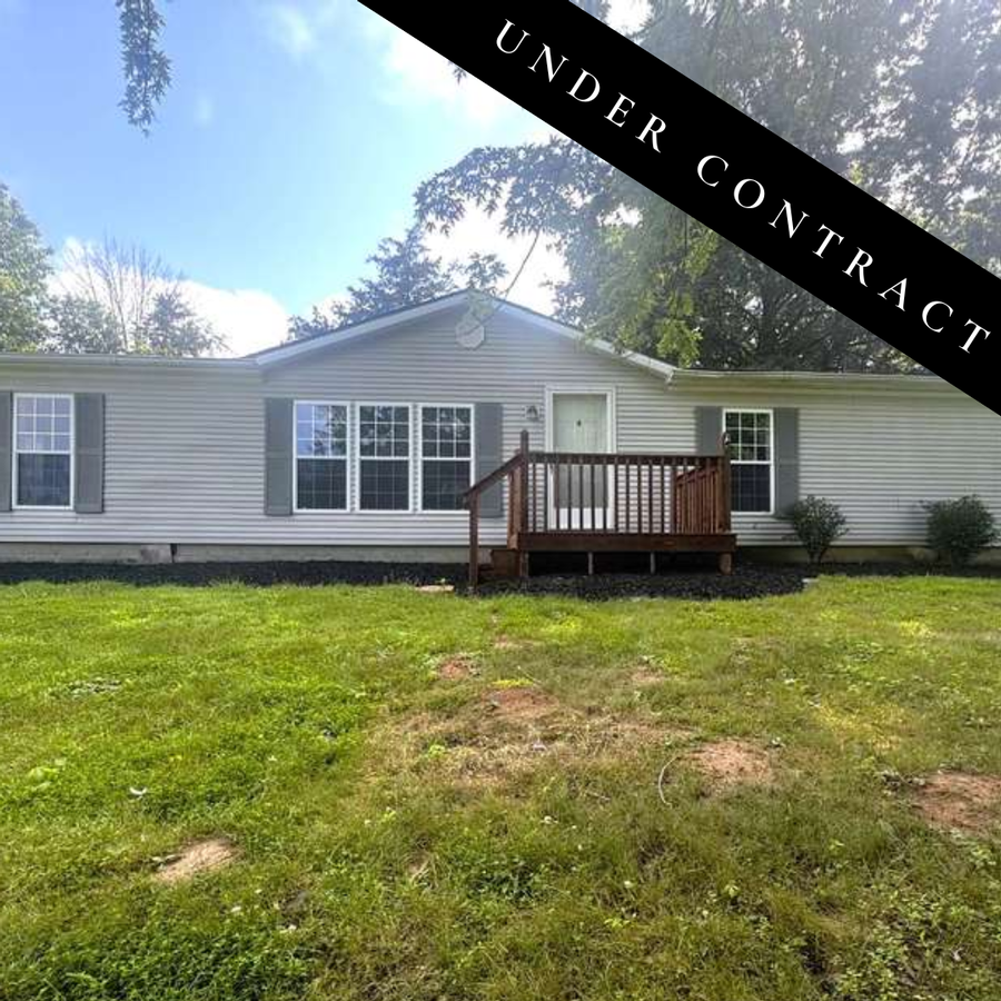 Home on 4.30 acres with shop & pond